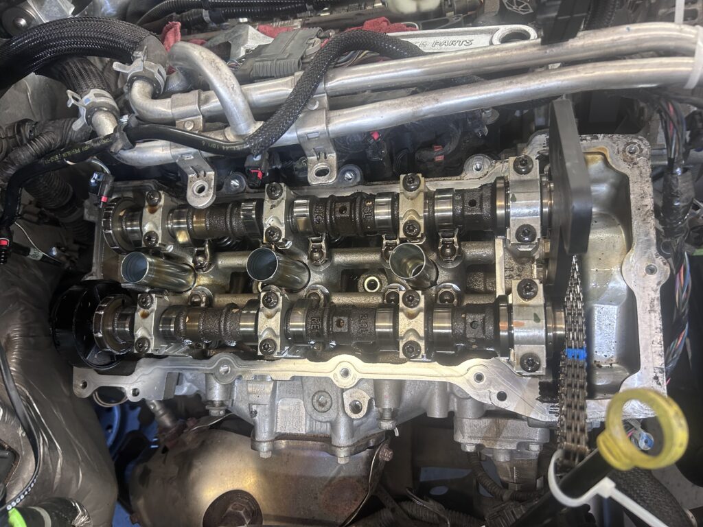 3.6L Jeep engine repair with camshaft and valvetrain service at Chimney Rock Car Care in Houston, TX