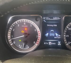 “Check engine light illuminated on dashboard in Houston vehicle