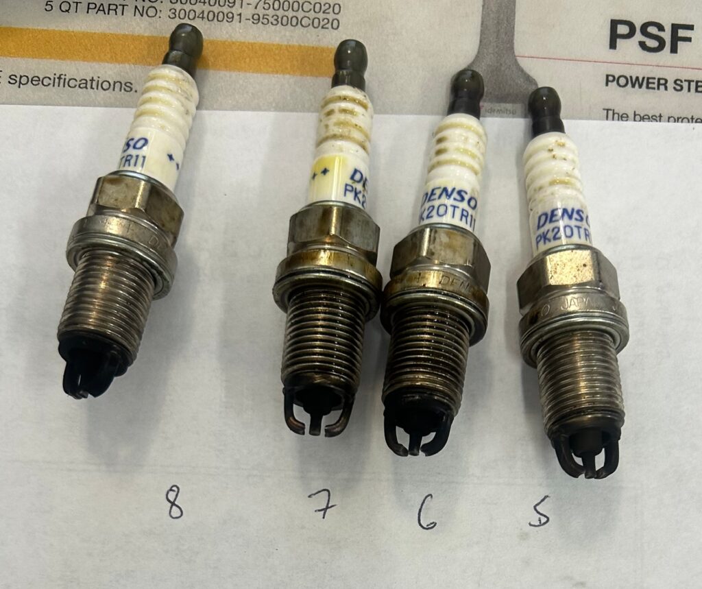 Worn spark plugs that can cause check engine light