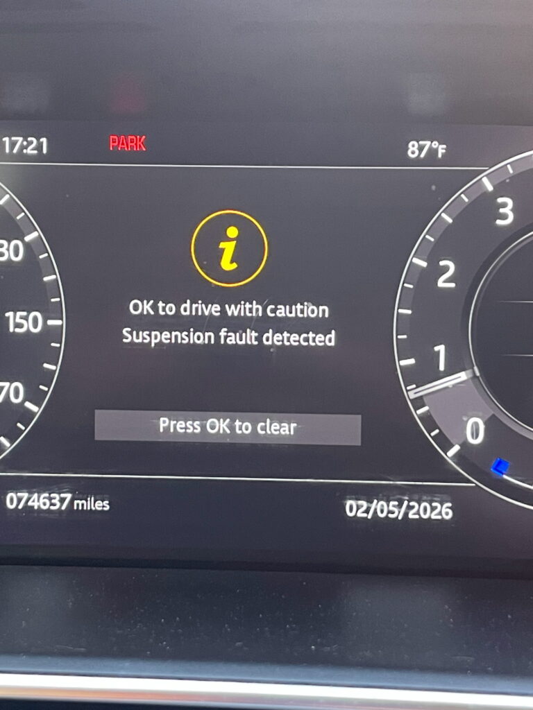 Suspension fault warning message on SUV dashboard