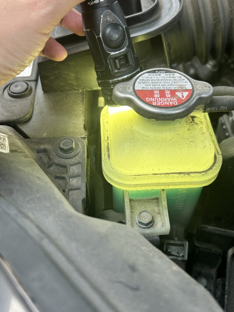Cooling system inspection during a vehicle maintenance check