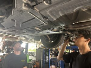 Chimney Rock Car Care technicians performing a back-to-school vehicle check in Houston